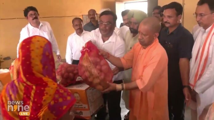 UP CM Yogi Adityanath inspects flood-affected areas; distributes relief materials