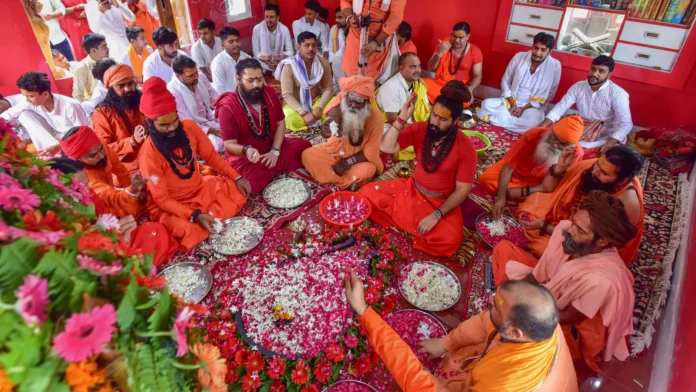 Devotees celebrate Guru Purnima with holy dips and prayers across India