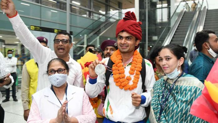 India's history-making Paralympians touch down in Delhi to rousing welcome