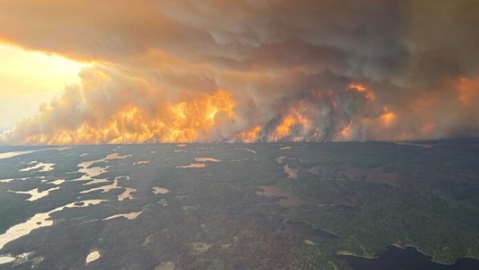 Four U.S. States Issue 'Stay Indoors' Warnings As Canadian Wildfire Smoke Deteriorates Air Quality
