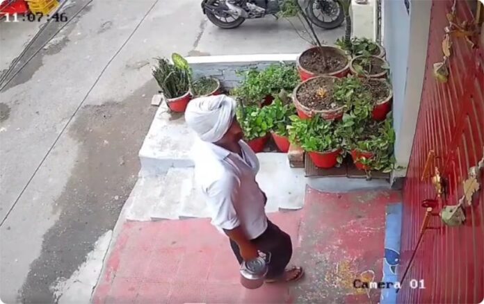 Lucknow Milkman Caught Spitting In Milk Before Delivery, Detained After CCTV Footage Goes Viral