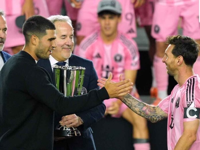 Carlos Alcaraz Presents Trophy To Lionel Messi